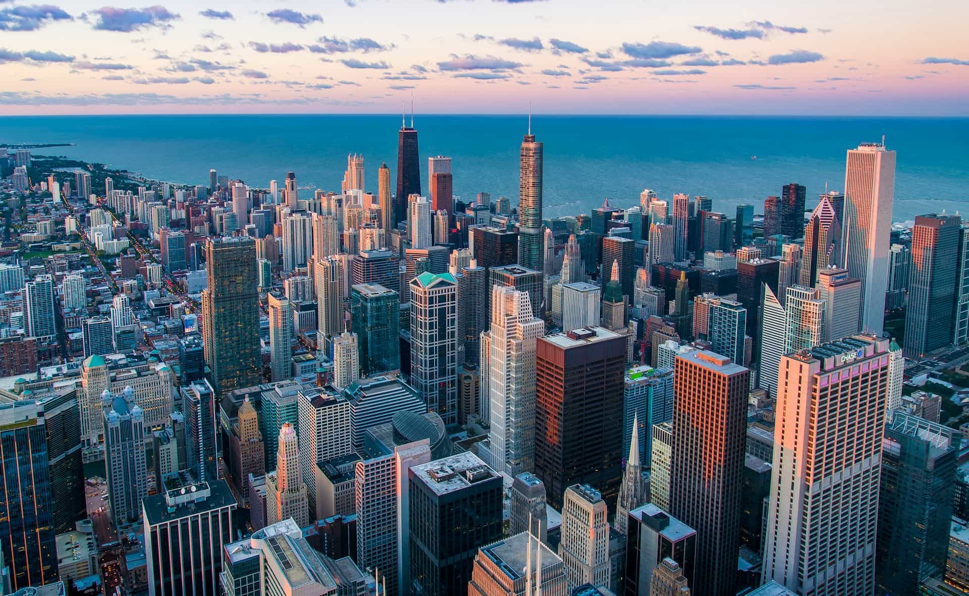 Modern residential and commercial real estate skyline at dusk