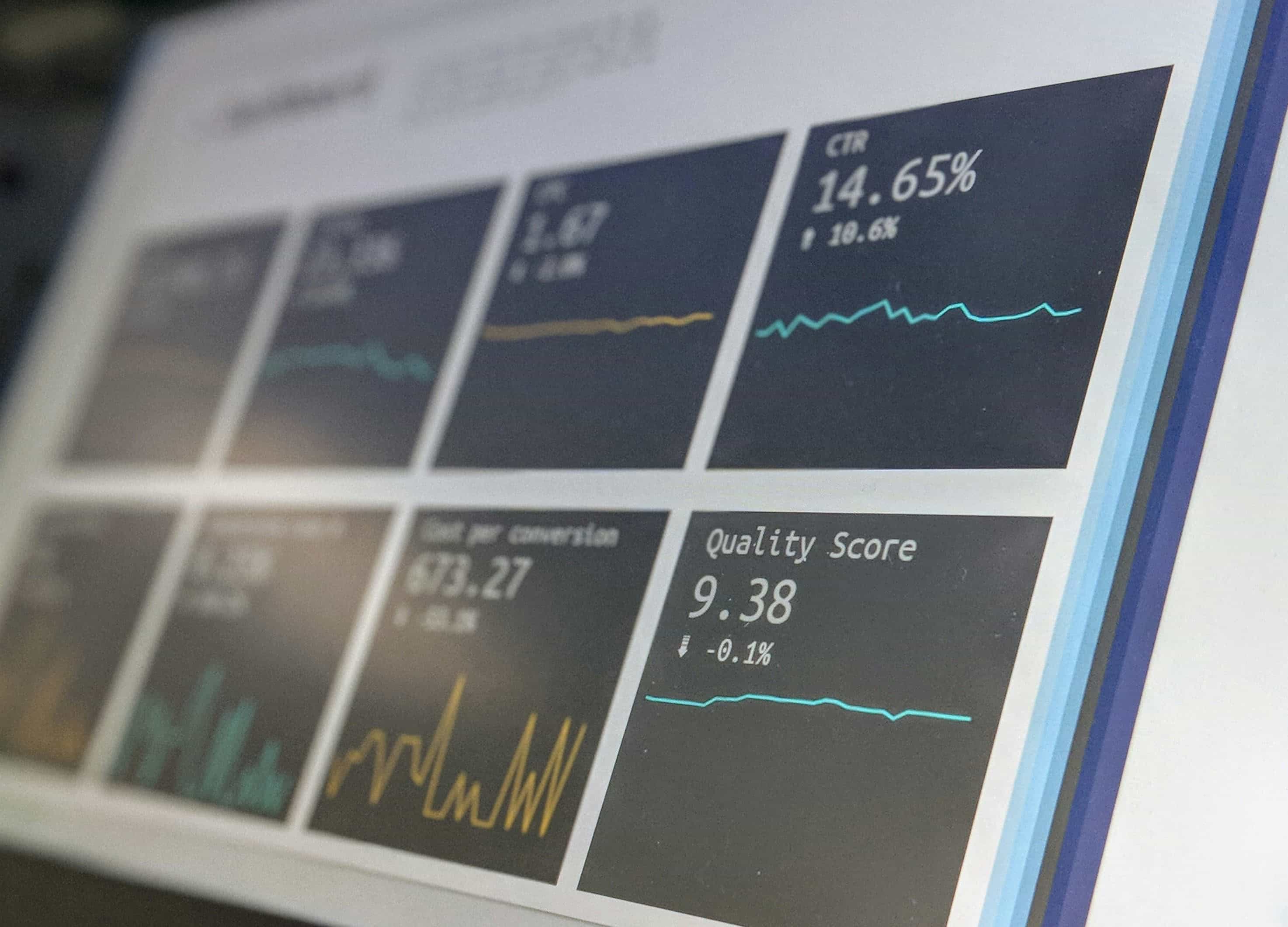 Clinical team collaborating around patient data in a modern hospital setting